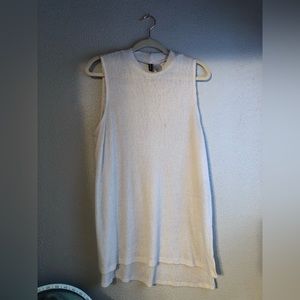 Cream sleeveless mock turtleneck ribbed tank